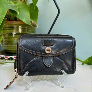 Cartera de cuero negra de diseño vintage de Cole Haan