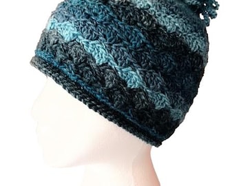 Gehaakte coquillebeanie met geketende pompon: elegante hoed van acryl
