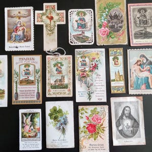 15 antiche immagini devozionali religiose, anni 1920-1950, dorate e in rilievo, litografiche a colori. Vergine Maria, Gesù, cherubini. Austriache.
