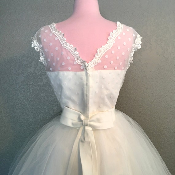 white polka dot wedding dress