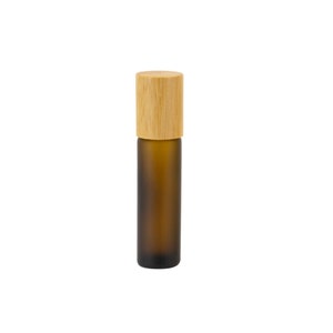 May include: A brown glass roller bottle with a wooden cap. The bottle is frosted and has a roller ball applicator.