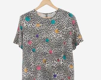Blusa vintage de los años 80 con estampado circular de guepardo, talla extragrande.
