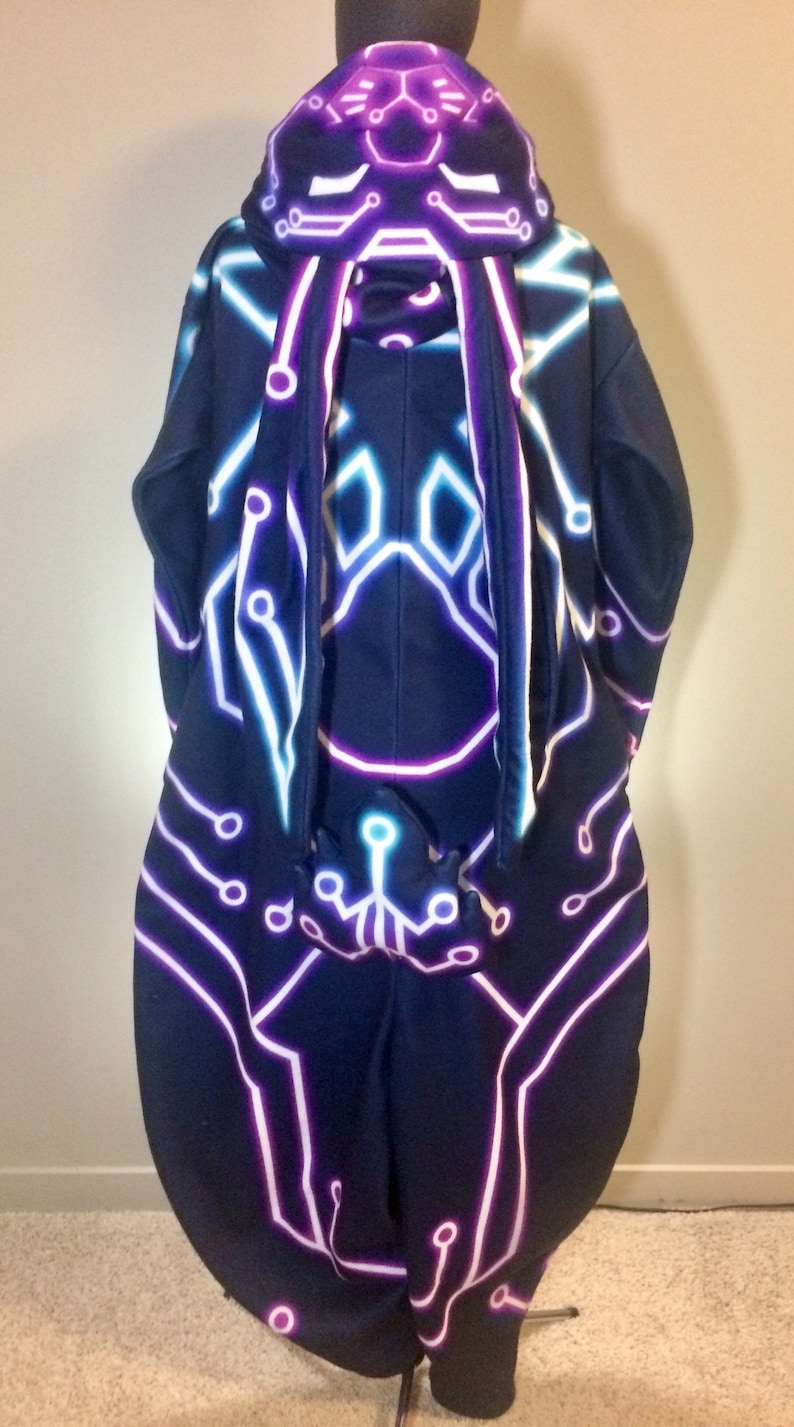 May include: Black hooded sweatshirt with a neon pink, blue, and white circuit board design. The hood has a neon pink and blue design that resembles a face.