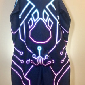 May include: A black hooded sweatshirt with a neon pink, blue, and white circuit board design. The design features a paw print in the centre.