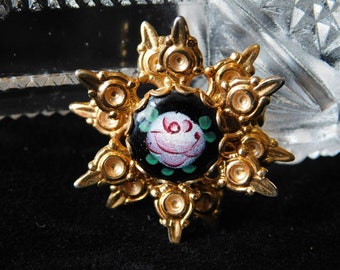 3-Dimensional Gold Tone Pin Brooch Black Center with Hand Painted Floral Center 1-1/4" Diameter - Unsigned, Vintage, Unmarked, Pointed