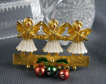 Gold Tone Angel Chorus Trio Enameled Unbranded 1-5/8" Wide by 1-1/2" Tall - Dangle, Drop, Unsigned, Christmas, Red, Green, White, Holiday