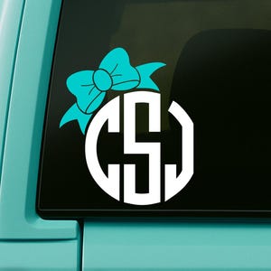 Autosticker cirkel monogram met strik - gepersonaliseerde initialen