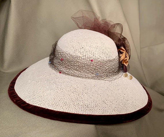 Ivory Straw Wide Brim Hat- Brown Trim of Feathers and 