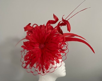 SOLD. Kentucky Derby Red fascinator "Ghosted in Red" SOLD
