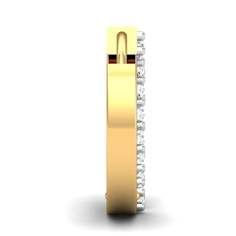 May include: A gold ring with a row of small diamonds around the band.