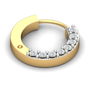May include: A gold nose ring with a circle of small diamonds around the edge.