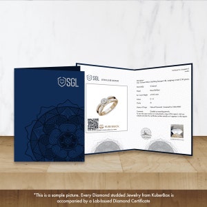 May include: A close-up of a diamond ring certificate. The certificate is from SGL Jewellers Report and features a gold ring with a round brilliant diamond. The certificate includes details about the diamond, including its carat weight, clarity, and color. The certificate also includes a QR code that can be used to verify the authenticity of the diamond.