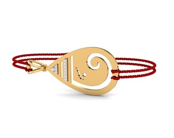 KuberBox Swastik O Ganesha 1/10 Diamond and 18K Gold Rakhi Bracelet for Raksha Bandhan