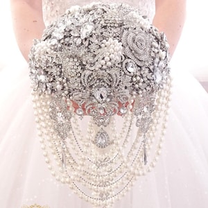 Pearl silver brooch bouquet by MemoryWedding. Cascading rich jeweled bridal broach bouquet