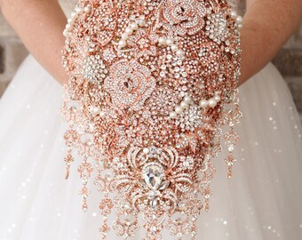 Extra shiny rose gold brooch bouquet. Cascade custom bridal bouquet