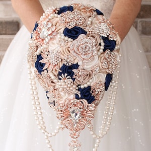 Navy blue bouquet. Rose gold brooch bouquet. Cascade bouquet. Wedding bouquet. Champagne teardrop bouquet. Jeweled bouquet