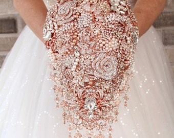 Extra shiny rose gold brooch bouquet. Cascade custom bridal bouquet