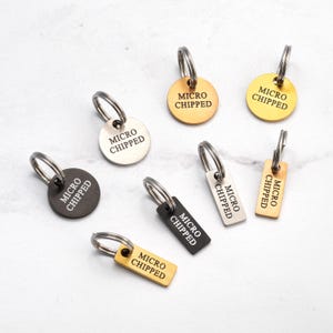 May include: Seven keychains with different colored metal tags that say "MICRO CHIPPED" in white lettering.