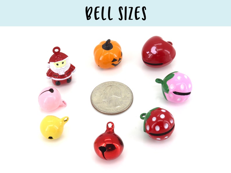 May include: Assortment of small jingle bells in various colours and designs, including a pumpkin, a heart, a strawberry, a Santa Claus, and a plain bell. The bells are shown next to a US quarter for size comparison.