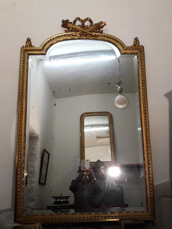 Large Antique French Gilded Mirror With A Beveled Glass