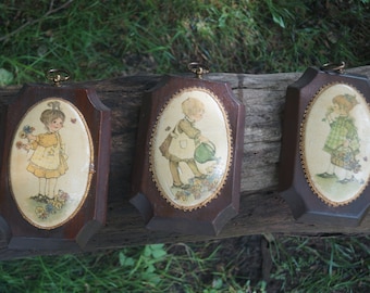 Set of three vintage 1970&#39;s Holly Hobby style girls grdening wood mounted wall plaques