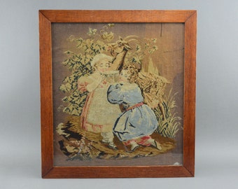 Antique framed tapestry picture children with goat