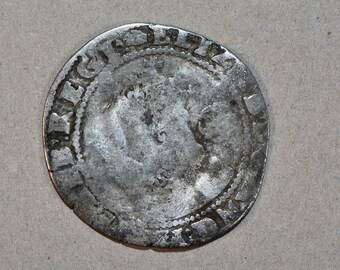 Moneda de plata de seis peniques de la Casa de la Moneda de Londres, acuñada en la Torre de Londres, de Isabel I, 1592, H11