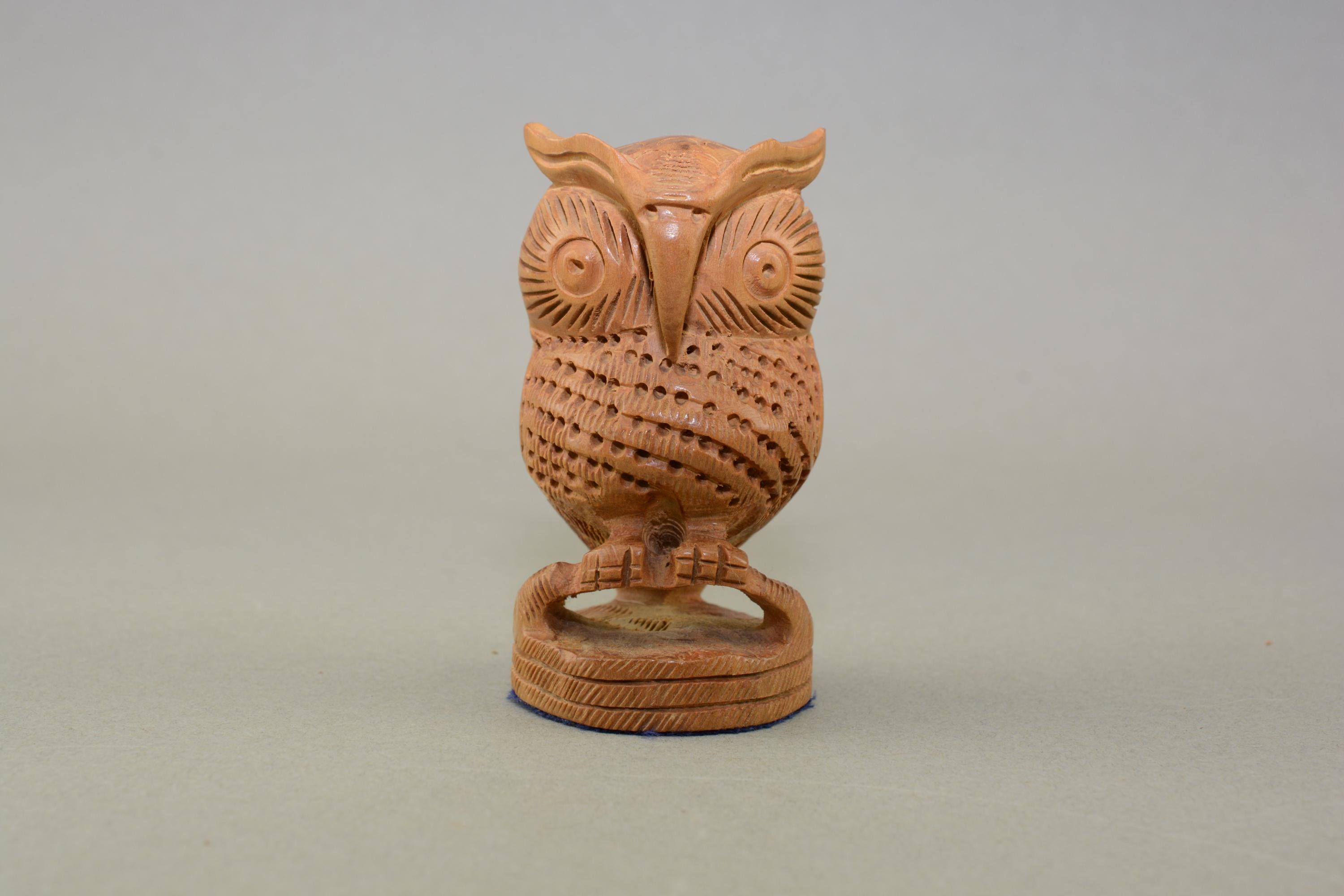 A vintage carved sandlewood owl