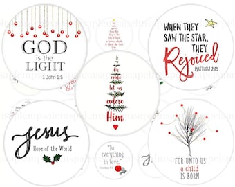 May include: Set of six Christmas-themed round stickers with various religious quotes and images. The stickers are white with black and red text and images. The stickers are 2 inches, 1.5 inches, 1.2 inches, and 1 inch in diameter.