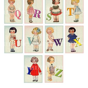 May include: A set of 10 alphabet cards featuring illustrations of girls holding letters. Each card has a different letter of the alphabet, from Q to Z, with a colorful background and a grid pattern.