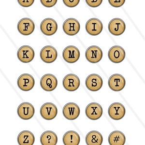 May include: A set of 26 alphabet letter and symbol keys in a vintage style. The keys are round and have a beige background with black lettering. The keys are arranged in alphabetical order.