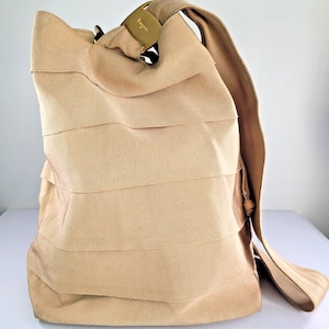 VTG Salvatore Ferragamo Beige Vara Grosgrain Ribbon Drawstring Bucket Backpack Salvatore Ferragamo | Bags | Ferragamo Ribbon Backpack  main image 3