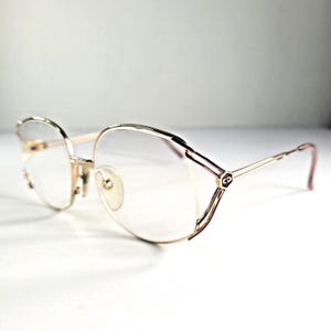 Vintage Christian Dior Gold Metal Eyeglass Frames with Pink Temple Tips (1980s)