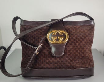 Bolso GUCCI. Bolso de hombro vintage Gucci de piel marrón con monograma GG.