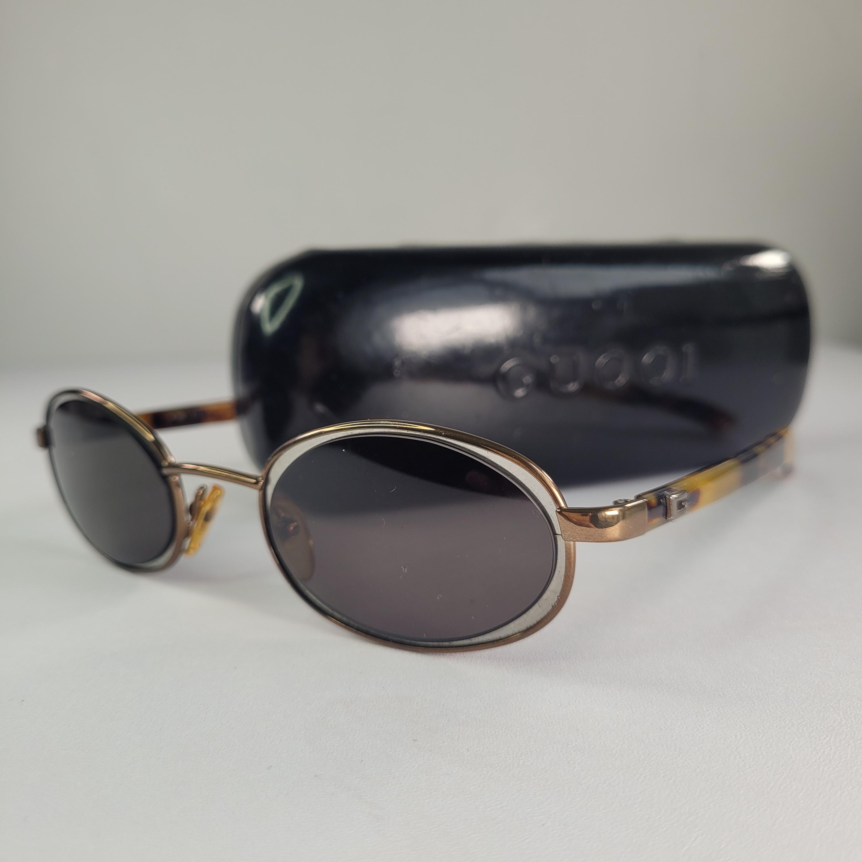 Gucci GG 1614/S Vintage 1990s Oval Sunglasses • Black Gold