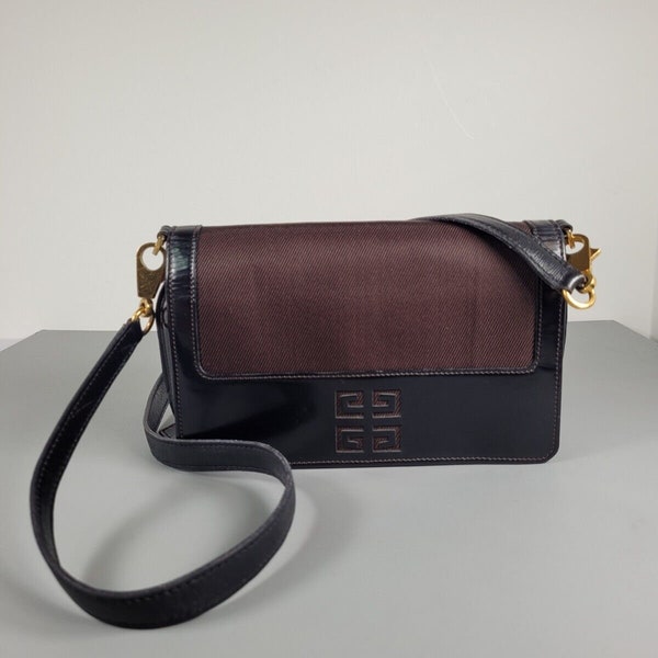 GIVENCHY Bag. Givenchy vintage dark brown wallet on chain / strap.