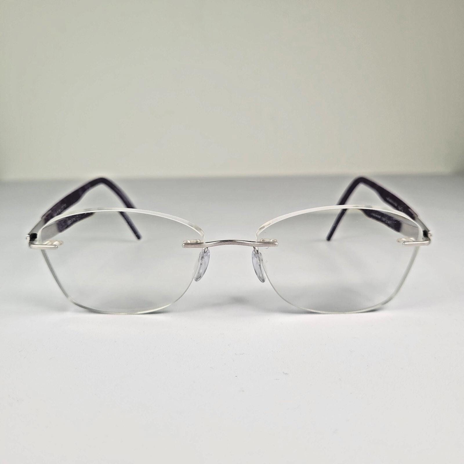 Vintage Silhouette Rimless Eyeglasses: Minimalist Purple 