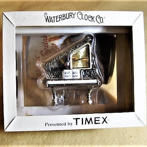 Open Piano Novelty Clock - Waterbury Clock Co., presented by Timex