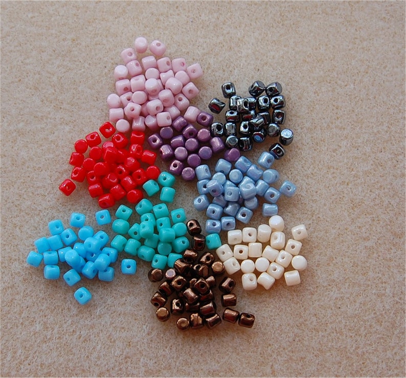 approx 10 gms of each MINOS Beads 9 colours listed below. \u00aePar Puca\u00ae a total of approx 90gms BARGAIN BASEMENT