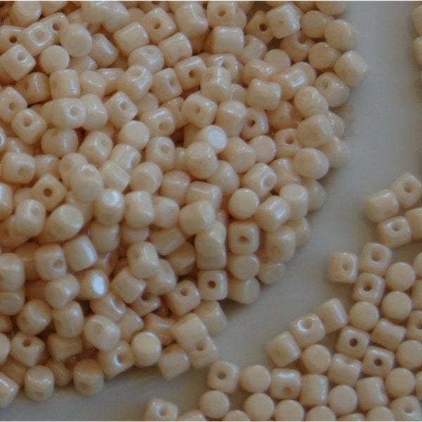 MINOS Beads, ®Par Puca® , Opaque Beige Ceramic Look, 03000/14413, sold in units of approx 10 gms.