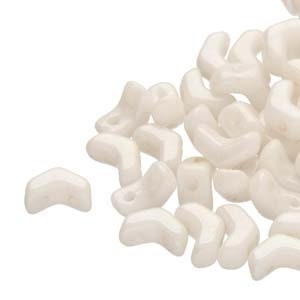May include: A pile of white ceramic beads shaped like a curved arrow. The beads have a smooth, glossy finish.