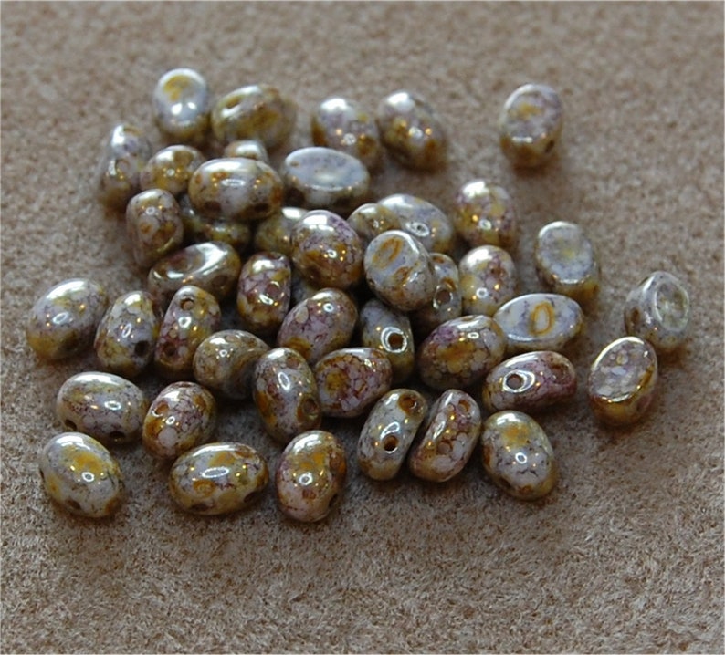 \u00ae Par Puca\u00ae Opaque Mix RoseGold Ceramic Look sold in units of approx 10 gms. SAMOS Beads 0300015695 2 Hole