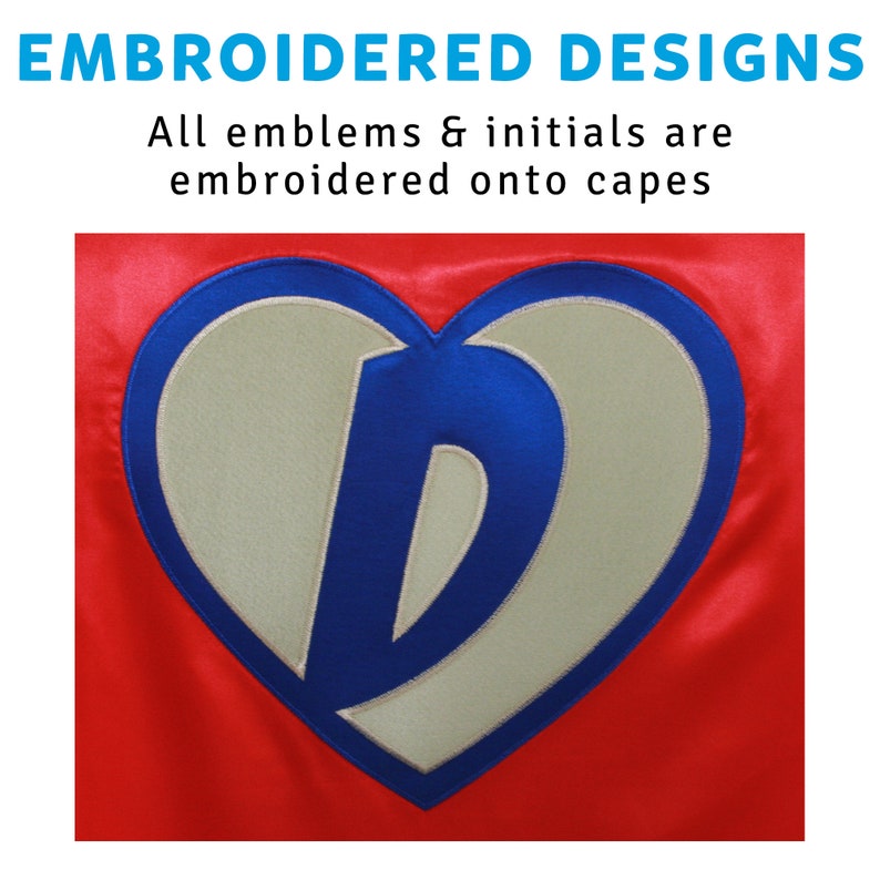 May include: A red satin cape with a blue and white embroidered heart-shaped patch featuring the letter "D". The text "EMBROIDERED DESIGNS" and "All emblems & initials are embroidered onto capes" is above the image.