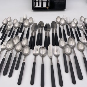 Cosmos Discotheque Flatware Set: Mid-Century Modern Stainless Service for 8