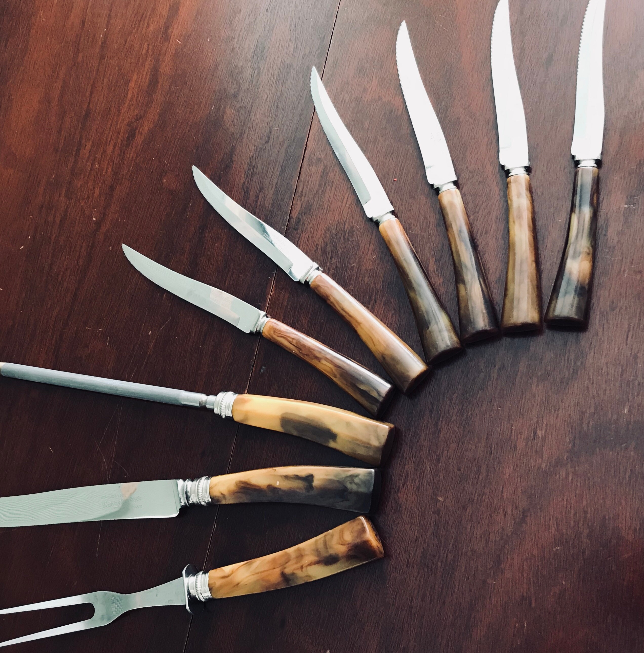 9 Knife set with a Rosy Marble Handle, a Black Cubic Zirconia Stone at the  Back of the Knife and a Black Onyx and Stainless Steel Decorative Rings