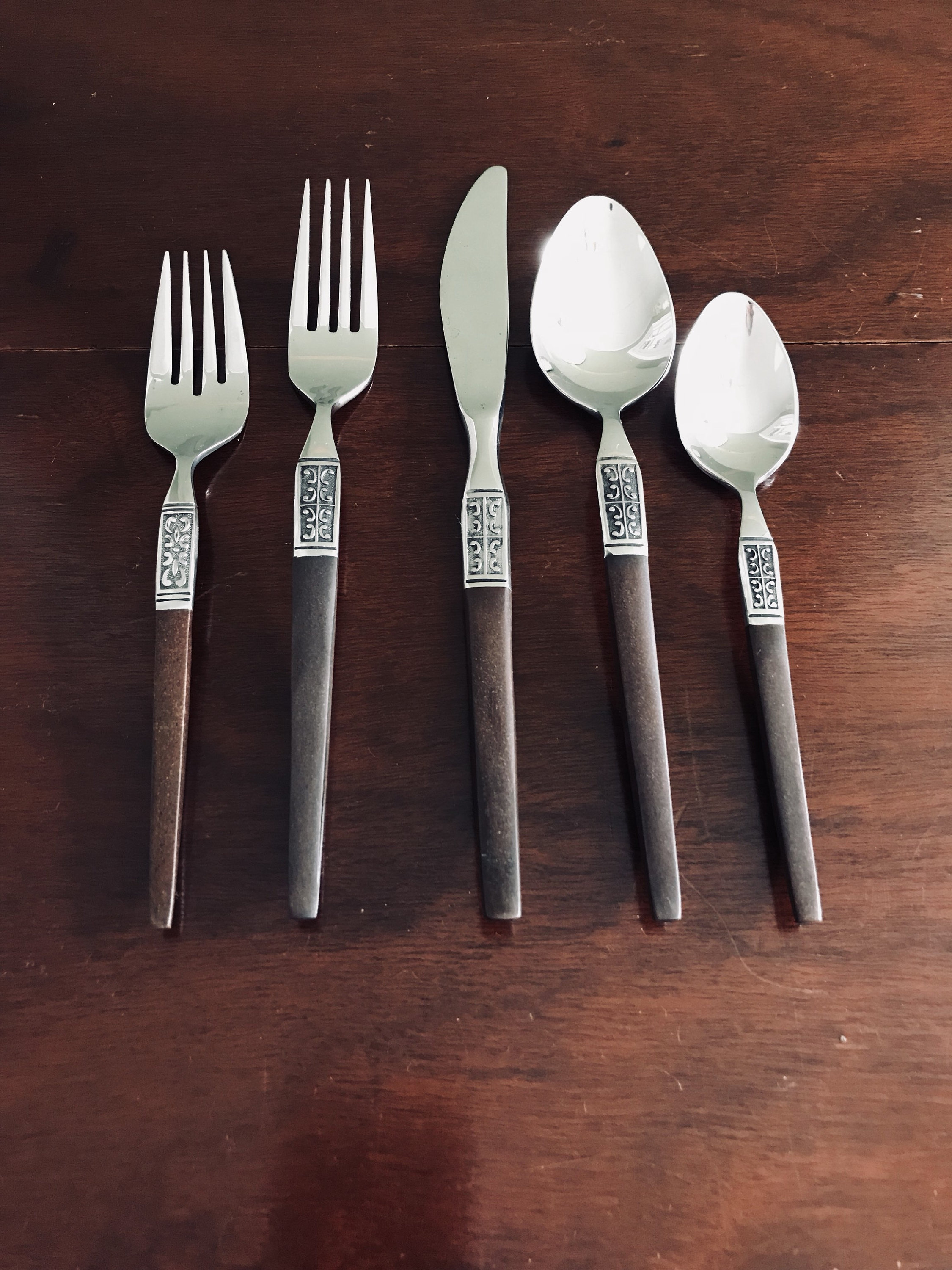 Danish Modern stainless flatware, service for 10, design on metal shaft