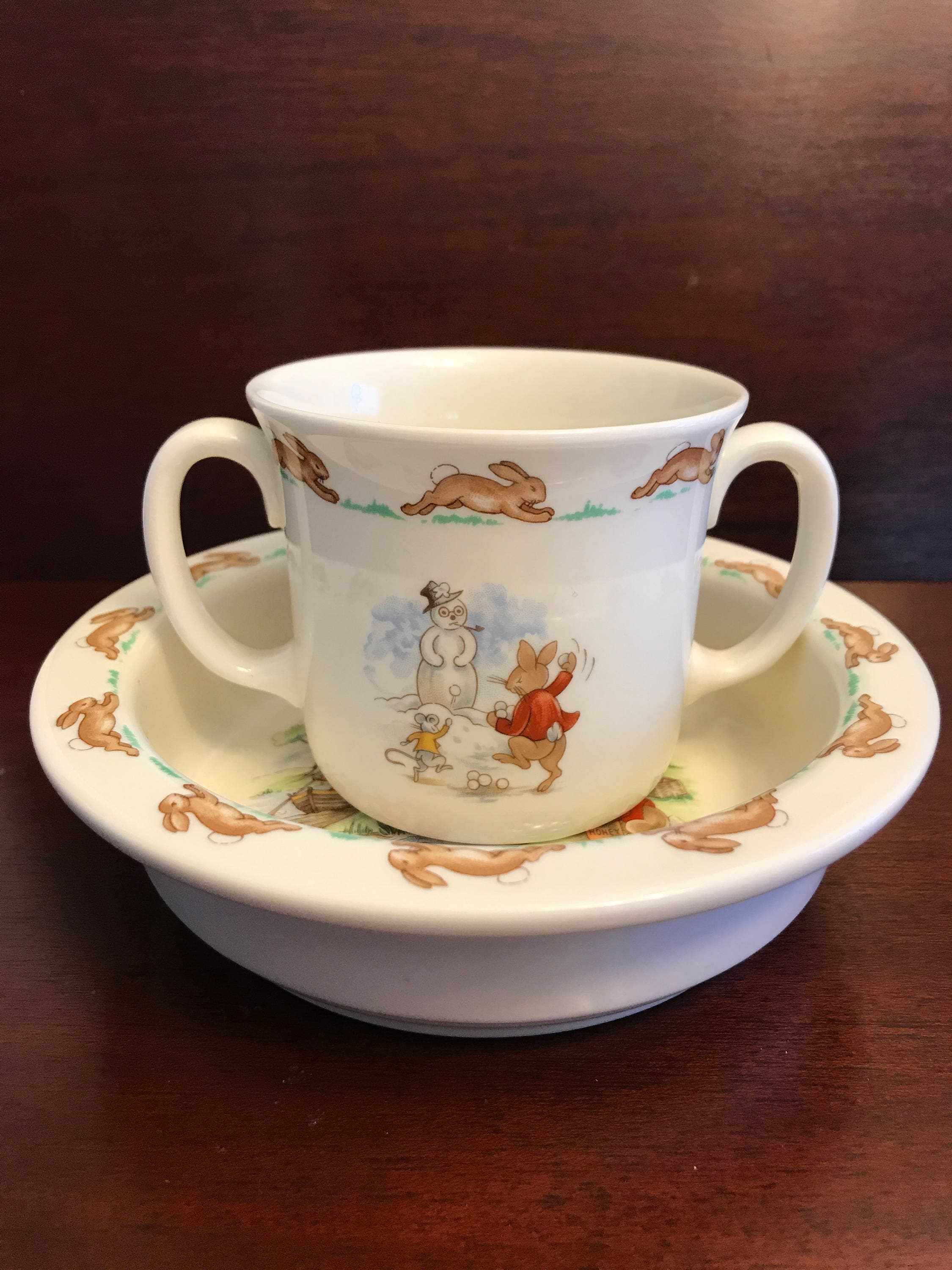 Royal Doulton Bunnykins, Porcelain child's Bowl and double handles cup