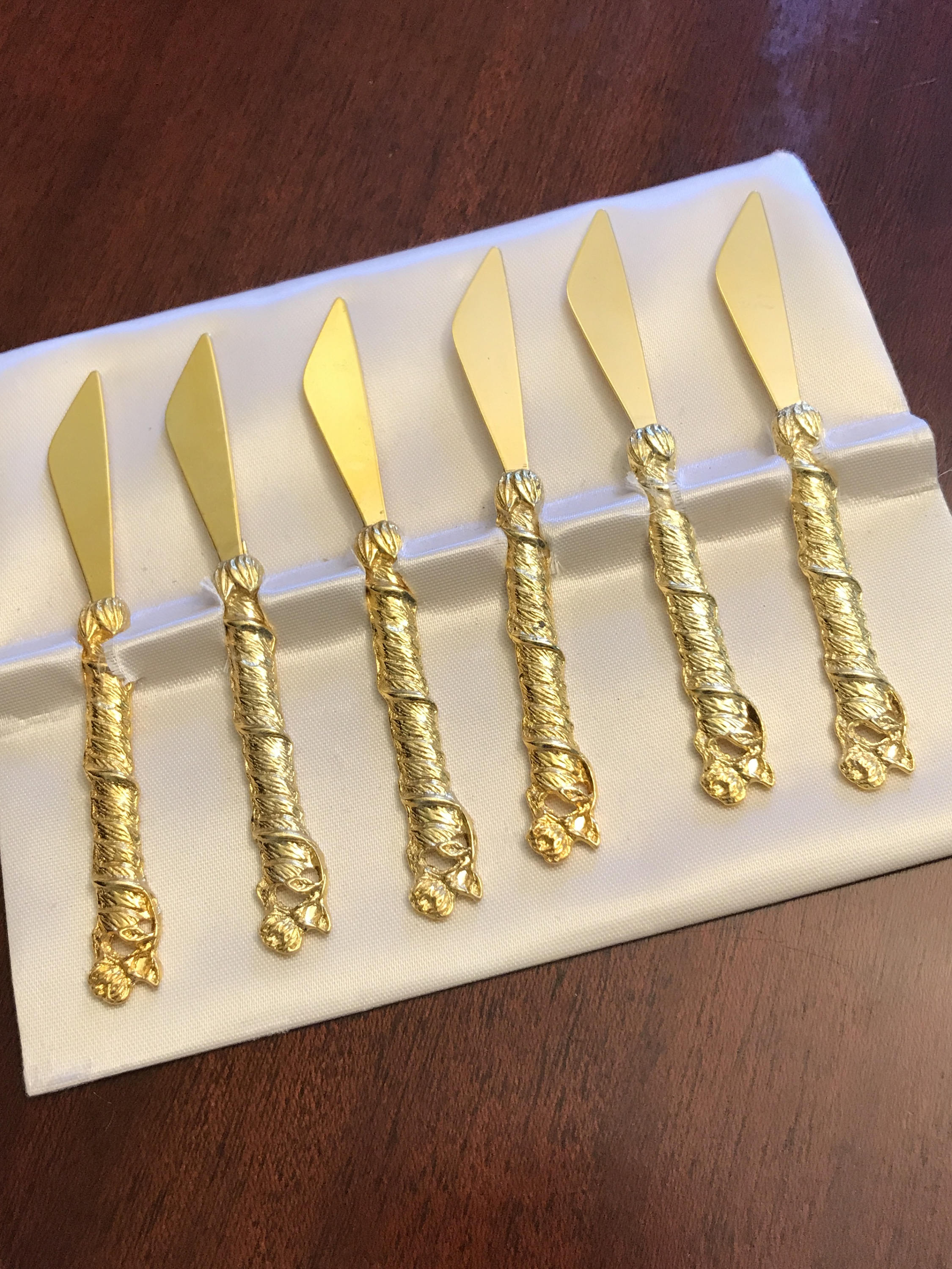 Vintage appetizer knives with ornate gold roses, mini spreaders, gold