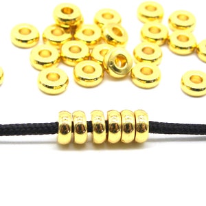 4 x 1.5 mm Flat Rondelle Stainless Steel Spacer Beads / Filler Beads with 1.5 mm Hole - Real 18K Gold Plated - 25 Pc.