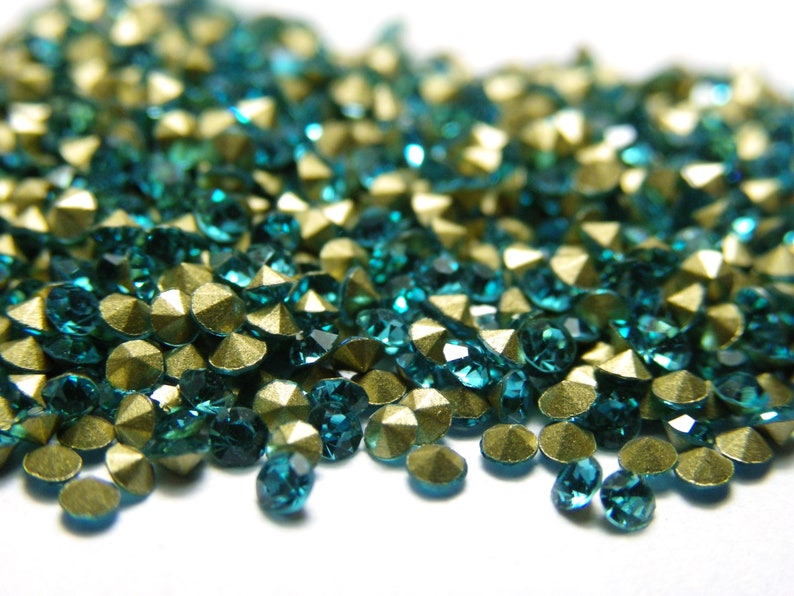 1.9 mm 6ss Grade A Back-Foiled Glass Rhinestone Chatons 100 Pc. Aquamarine light blue image 1